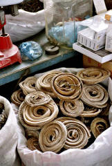 Kashgar Sunday market: Dried snake coils at Chinese medicine stall