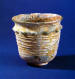 Cup with ornamental protrusions